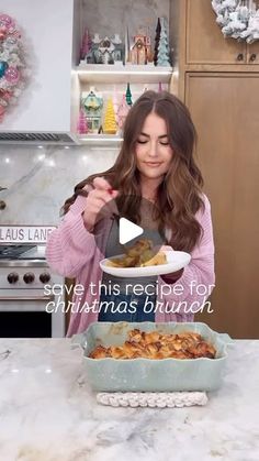 a woman holding a bowl of food in front of her face and the words save this recipe for christmas brunch