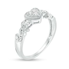 Present her with a romantic token of your affection with this vintage-inspired diamond heart promise ring. Fashioned in sterling silver A heart-shaped composite of round diamonds sparkles in an open frame of intricate milgrain detailing. The sculpted vine-like shank gleams with diamond-touched leaf shapes and bezel-set diamonds. This promise ring captivates with 1/8 ct. t.w. of diamonds. Heart Cut Diamond Ring With Diamond Accents For Promise, Diamond Heart Ring With Single Cut Diamonds For Anniversary, Heart-shaped White Gold Diamond Ring With Accents, Anniversary Heart Cut Diamond Heart Ring, Classic Diamond Ring With Accents For Valentine's Day, Classic Heart Shaped Ring With Diamond Accents, Classic Heart-shaped Ring With Diamond Accents, Classic Diamond Heart Ring For Valentine's Day, Heart-shaped Diamond Ring With Accents For Valentine's Day