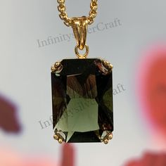 The only tektite in gemstone quality- Moldavite is the only tektite in gemstone quality. This makes moldavite unique among gemstones. It is beloved for its peculiarity and rarity, which is reflected in the wide variety of sizes, shapes, textures and shades of green. Moldavites are often collected in their original rough form, which has many variations. From deeply etched to almost smooth with a fine play of lines on the surface. Origin of the name- Moldavite is found near the Vltava river in the Emerald Cut Tourmaline Jewelry Gift, Rectangular Tourmaline Gemstone Jewelry, Rectangular Tourmaline Jewelry Gift, Rectangular Tourmaline Jewelry For Gifts, Elegant Untreated Green Jewelry, Moldavite Jewelry, Nature Wedding, Green Stone, Flower Pendant