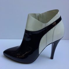 New Maison Martin Margiela Leather Ankle Boots. Retail $780.00. Sizes: 38, 39.5eu. Color: Black/White. Genuine Patent Leather Upper. Leather Lining And Sole. Side Zipper Closure. 4.25 Inches Heel. Condition: New Never Worn Shoes With Minor Marks/Scuffs. Box Not Included. Chic High-top Heels Medium Width, Chic High-top Heels With Reinforced Heel, Chic High-top Heeled Boots With Reinforced Heel, Elegant High-top Boots For Formal Occasions, Elegant White Evening Boots, Elegant White Formal Boots, White Patent Leather High Heel Boots, Elegant High-top Heeled Boots With Reinforced Heel, Elegant High-top Heeled Boots