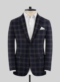 Reveal the inherent mastery of style with our Italian Wool Agrosi Jacket. Crafted from the finest wool blend, this jacket boasts a distinguished plaid pattern in deep navy, accented with striking red and white lines. The rich texture and intricate weave provide both warmth and a luxurious feel, making it perfect for any occasion. From daily business engagements to elegant weddings and lively parties, this jacket stands out as a distinguished and versatile choice.   Look features a 2 button jacket with notch lapels, horn royal black buttons, single vent and three cuff buttons.    Click 'Customize Now' to modify the look if needed.   Lining: Viscose. Elegant Weddings, Button Jacket, Wool Suit, Suit Shop, Double Breasted Suit, Rich Textures, Jacket Buttons, Black Button, Fabric Samples