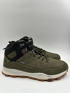 Men's Size 13, High Top Green Hikers w/ Synthetic Suede Toe and Heel Caps. Blaze your own trail with these high-top green hikers. With synthetic suede toe and heel caps and rugged rubber tread, these shoes are built to handle rough terrain. Whether you're trekking through the wilderness or exploring the city streets, these hikers will keep your feet comfortable and supported on any adventure. Sporty Green Lace-up Hiking Boots, Rugged Khaki Hiking Boots, Casual Durable Hiking Boots For Adventure, Rugged Khaki Hiking Boots For Outdoor, Casual Durable Hiking Boots For Outdoor Activities, Durable Khaki Hiking Boots For Outdoor Activities, Green Round Toe Hiking Boots For Outdoor, Green Round Toe Hiking Boots, Green Lace-up Hiking Boots