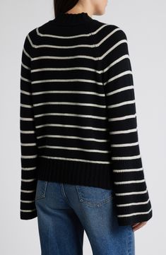 Fabulously fluted sleeves bring a bit of drama to this boldly striped sweater knit with a cozy mock neck and widely ribbed trim. Mock neck Long sleeves Ribbed cuffs and hem 52% acrylic, 28% polyester, 20% nylon Dry clean Imported Fluted Sleeves, Striped Sweater, Sweater Knit, Sweater Sleeves, Sleeve Sweater, Black Sweaters, Mock Neck, Sweater Top, Knitted Sweaters