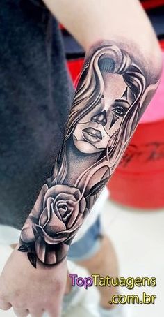 a woman with a rose tattoo on her arm