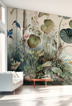 a living room with a large mural on the wall