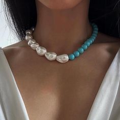 B A R O Q U E ∙ P E A R L ∙ N E C K L A C E Introducing our large baroque pearl necklace with a striking turquoise blue accent. This elegant and stunning design combines the boldness of large baroque pearls with the beauty of blue. Perfect for making an unforgettable impression. 💎Features: * Material: High Luster Glass Baroque Pearl, Mother of Pearl Blue Beads, Brass Clasp with Zircon * Beads Size:    Pearl: Approx 0.6x0.8 inch / 1.5x2cm   Blue Beads: 10mm * Color: White Pearl, Blue Beads, Silv Blue Pearl Necklace With Natural Stones, Blue Pearl Jewelry For Jewelry Making, Bold Statement Necklaces, Bridal Pearl Necklace, Care Care, Big Pearl, Blue Accent, Necklace Bridal, Baroque Pearl Necklace