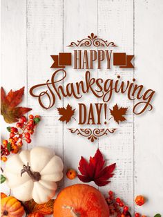 happy thanksgiving day with pumpkins and autumn leaves on white wood background - stock photo