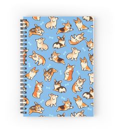 a spiral notebook with an image of corgi on it, all over the page