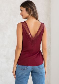 Inspired by vintage designs, our lace trim tank top is a timeless ultra-feminine style. Featuring a delicate lace trim v-neckline in front and back and a relaxed and easy silhouette. An essential elevated style that transitions seamlessly from day to night. Lace tank top Relaxed fit Sleeveless Lace trim v-neckline in front and back Hip length Holiday-ready top FINAL SALE Model is 5'9, wearing a size S.Style: I-13337W-RFM Ultra Feminine Style, Easy Silhouette, Lace Trim Tank Top, Ultra Feminine, Elevated Style, Lace Straps, Modern Romance, Holiday Ready, Lace Tank Top