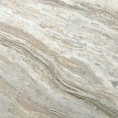 a close up view of a marble countertop with white and grey colors on it