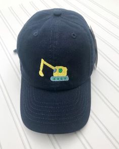 "Personalized Kids or Toddler size baseball hat. The hat is 100% cotton. The hat is a 6 panel, unstructured, low profile style with an adjustable metal ring tuck strap. Comes in TWO sizes: 2-5 Years and 6-9 Years. Please Choose the size upon checkout. MEASUREMENT: 2-5yrs- 3.5\" Crown, 2.5\" Curved seamed bill, 6-9yrs- 4\" Crown, 2 5/8\" curved seamed bill. The hat includes a design on the front of the hat, AND a 3 letter monogram or first name on the back of the hat. The hats can also be customi Toddler Hats Boy, 3 Letter Monogram, Mermaid Hat, Kids Toys For Boys, Monogram Hats, Kids Hat, Hat Custom, 3 Letter, Toddler Hat