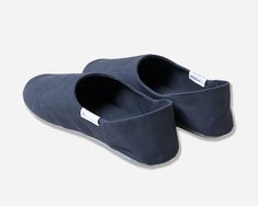 Morihata's stylish and functional ABE canvas room slippers in grey are crafted from resilient "No. 8" duck canvas, a material most often used for its strength, breathability and ease of cleaning. The two-way heel design allows you to wear it both down like a slipper, or up like a shoe for added mobility. With a soft, lightly padded suede-like sole, these room shoes offer subtle traction and protect floors from scuffs and scratches. For indoor use only. Review our size guide to determine your bes Gray Non-slip Slip-ons, Gray Closed Toe Slip-ons, Comfortable Everyday Slippers With Removable Insole, Everyday Slip-on Slippers With Rubber Sole, Gray Casual Indoor Slippers, Casual Indoor Slip-ons With Rubber Sole, Comfortable Everyday Slippers With Rubber Sole, Cotton Slip-ons With Rubber Sole, Gray Slip-on Slippers For Indoor Use