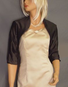 Classic 3/4 sleeve satin bridal bolero wedding jacket. Made from very high quality bridal satin and completely lined on the inside with the same beautiful satin as the exterior layer. Newly made in each size and ready to ship. VIEW PICTURES FOR SIZE AND MEASUREMENT CHART If you are needing more then four of this item just let us know. We are happy to offer VOLUME DISCOUNTS We keep several in each size in stock so that we can ship all orders out ASAP! If you need more then the quantity listed jus Elegant Long Sleeve Formal Shrug, Fitted 3/4 Sleeve Party Shrug, Fitted Elegant Evening Shrug, Elegant Fitted Wedding Shrug, Dress Cover Up Formal, Chiffon Bolero, Bridal Bolero Jacket, Bolero Jacket Wedding, Chiffon Jacket