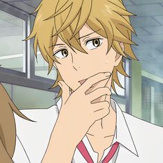 an anime character with blonde hair is looking at the camera and has his hand on his face