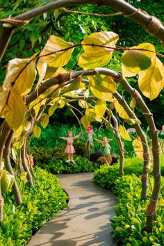 children playing in the garden with trees and plants