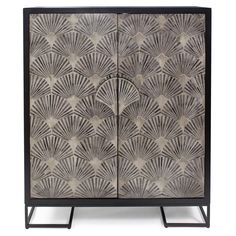 an art deco cabinet with fan design on the front and side panels, black metal frame