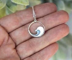 "This fantastic solid sterling silver ocean wave necklace is so striking but so simple. The waves are a contrasting oxidized sterling silver and a high polish sterling. Pendant hangs on a sterling silver cable chain at your choice of length. This makes a great gift for any ocean or beach lover or for your everyday summertime wear. Wave charm measures approximately 3/4\" (please see size photo with penny for comparison). ♥ ♥ ♥ Check out more necklaces here: https://www.etsy.com/shop/woobiebeans?s Ocean Pendant, Silver Wavy Necklace For Gift, Sterling Silver Wavy Necklace For Gifts, Cruise Jewelry, Wave Jewelry, Ocean Inspired Jewelry, Ocean Necklace, Beachy Jewelry, Wave Necklace