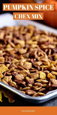 pumpkin spice chex mix in a baking pan with the title overlay reading, pumpkin spice chex mix