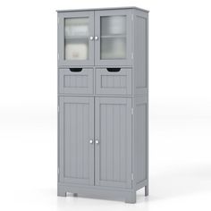 a gray cabinet with two glass doors on the top and bottom shelf, in front of a white background