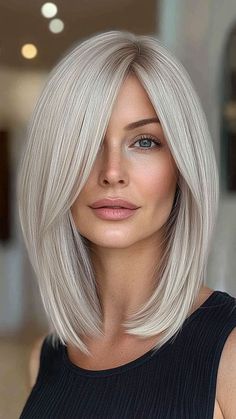 Flattering Bangs for Older Women: 20 Must-Try Hairstyles Shoulder Length Hair With Bangs Side Part, Shoulder Length Hair With Side Fringe, Sophisticated Haircuts For Women, Hair Bob With Layers, Long Bob With Side Swept Bangs, Haircut Straight Hair Short, Hair Styles For Fat Face, Medium Length Platinum Blonde Hair, Long Stacked Bob Haircut