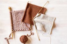 some knitting supplies are laying out on the table