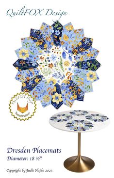 a table with a blue and yellow flower design on it