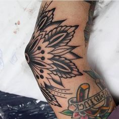 a person with a tattoo on their arm