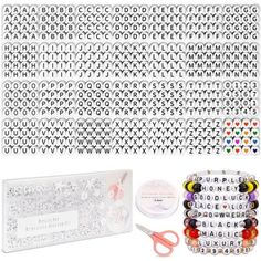 an assortment of letters and numbers are shown with scissors, beads, and other crafting supplies