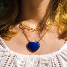 With its stunning in simplicity design and gorgeous color, this necklace represents the universal symbol of love. The faceted, domed heart of natural lapis pendant hangs from a gold filled chain. Alone or layered with your other favorites, its flirty elegance gives it a statement making vibe. Pendant: 30mm x 35mm Necklace: 16' plus an extender Layer this necklace with: https://www.etsy.com/listing/1015879146/multicolor-gemstone-beaded-necklace?ref=shop_home_active_20&frs=1&cns=1 or: http Lapis Lazuli Pendant Necklace With Gemstone Beads, Colorful Beads Lapis Lazuli Necklace Gift, Lapis Lazuli Beaded Pendant Jewelry, Lapis Lazuli Pendant Beaded Necklace For Gifts, Handmade Multicolor Lapis Lazuli Jewelry, White Coral Necklace, Lapis Pendant, Lapis Necklace, Gemstone Beaded Necklace