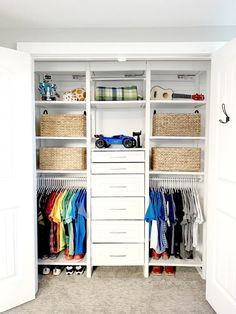 an organized closet with clothes and baskets