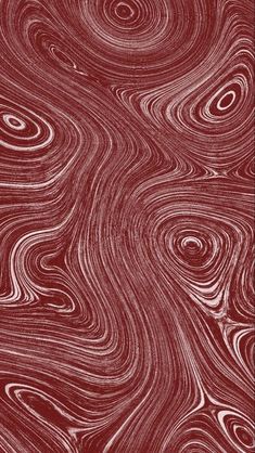 an abstract red and white background with swirly lines on it's surface, in the