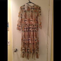 Never Worn....Beautiful Embroidery All Over..Tag Says Sz L But Runs Small...I'm A 4-6 And Fits Me ...More Like A Sz 6-8 ...All Offers Considered! Spring Floral Print Lace Embroidered Dress, Embroidered Lace Dresses For Fall, Fall Embroidered Lace Dresses, Beige Embroidered Midi Dress For Spring, Spring Embroidered Lace Dress, Embroidered Lace Dress For Spring Wedding, Embroidered Lace Wedding Dress For Spring, Multicolor Embroidered Dress For Fall, Fall Lace Dress With Floral Embroidery