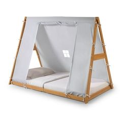 a bed with a white sheet on top of it