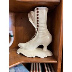 Beautiful ceramic statue of a victorian style ladies shoe / boot with a bright color of red on the inside. Signed on the bottom by Atlantic Mold Company. This could be used as decor on a shelf as it was in this estate or planter/ vase. Shoe Lamp, Ceramic Statue, Victorian Boots, Ladies Shoe, Shoe Boot, Antique Ceramics, Late 20th Century, Victorian Style, Bright Color