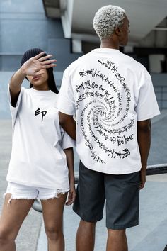 This T-shirt is engraved with the Heart Sutra. The Heart Sutra was brought to China from India about 1,500 years ago by a high monk named Genjo(玄奘). It became the foundation of Buddhism and was later introduced to Japan. However, due to religious reforms and suppression in later periods, Buddhism as a state religion remains prominent only in Japan and a few other regions. To summarize the Heart Sutra: "Kannon (Avalokiteshvara) said, 'In this world, there is no self, no you, no good, no evil, nothing truly exists. All that exists are the body, senses, images, emotions, and thoughts, and these do not belong to me nor do they have any true essence. By realizing that nothing in this world has a true essence, one can achieve a state where nothing hinders the mind and thus attain the perfection White Graphic T-shirt For Cosplay, White Screen Print Shirt For Cosplay, White Graphic Print Shirt For Cosplay, White Crew Neck Shirt For Cosplay, White Cotton Shirt For Cosplay, Naruto Jujutsu Kaisen, Japanese Calligraphy Art, Naruto T Shirt, Heart Sutra