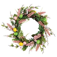 a wreath with pink flowers, green leaves and lemons on it is shown against a white background