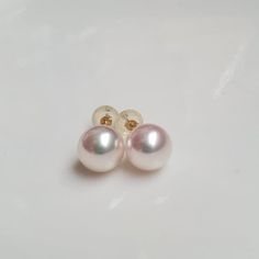 Cultured perfect round Japanese Akoya pearl post earrings, high luster Saltwater pearls *Made with grade top luster saltwater Akoya pearls and solid 18Kt gold. Safe for sensitive skin. * Very slight blemish if there is any * Various size to choose from at checkout *All my pieces are safely packed in a gift presentation box. See other design in my store:  http://www.etsy.com/shop/JWJewelrybox Please contact me if you have any comment. Thanks for visiting. Classic Pearl White High Luster Earrings, Classic Round Pearl Earrings For Anniversary, Classic Pearl Earrings For Anniversary, Round Akoya Pearl Earrings, Classic Round Pearl Earrings, Classic Pearl White Pearl Earrings With Round Beads, Classic White Pearl Earrings With Round Beads, White Round Bead Pearl Earrings For Formal Occasions, Formal White Pearl Round Bead Earrings