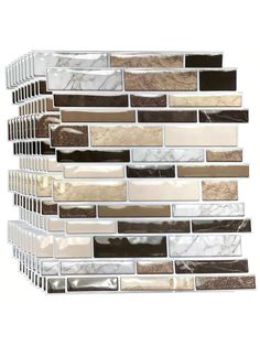 the back side of a glass tile wall with white and brown marble tiles on it