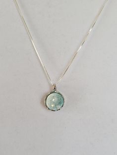 "This Geode pendant is such a gorgeous color. This delicate chain is an 18\" L box chain.  There is a sturdy Spring ring closure for your security. This Silver plated pendant has an Aqua Geode in a Bezel set setting.  The colors vary within this Geode, and there is a lot of natural crystal sparkle. 39.00 Gift Box Included" Blue Pendant Necklace With Delicate Chain, Delicate Blue Pendant Chain Necklace, Blue Pendant Chain Necklace With Delicate Chain, Blue Sterling Silver Charm Necklace With Adjustable Chain, Elegant Turquoise Chain Necklace Gift, Blue Silver Chain Necklace As Gift, Hypoallergenic Silver Snake Chain Necklace, Blue Round Charm Necklaces For Everyday, Everyday Blue Round Charm Necklaces