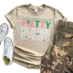 a t - shirt that says pretty black and educated with camo shorts