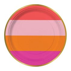 an orange and pink paper plate on a white background