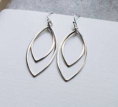 "Marquise shape super lightweight sterling silver earrings. 1.75\" long" Silver Small Hoop Teardrop Earrings, Elegant Silver Small Teardrop Earrings, Modern Sterling Silver Marquise Jewelry, Modern Marquise Sterling Silver Jewelry, Modern Silver Marquise Jewelry, Modern Marquise Silver Jewelry, Sister Jewelry, Coin Earrings, Crescent Moon Necklace