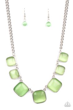 Encased in square silver fittings, a dewy collection of green cat's eye stones gradually increase in size as they link below the collar for a whimsical pop of color. Features an adjustable clasp closure.

 Sold as one individual necklace. Includes one pair of matching earrings. Cat Eye Necklace, Paparazzi Accessories Jewelry, Cats Eye Stone, Green Gems, Paparazzi Accessories, Eye Stone, White Rhinestone, Paparazzi Jewelry, Green Necklace