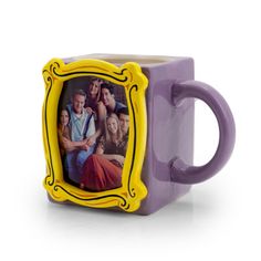 a purple coffee mug with a yellow frame on the front and bottom, featuring an image of friends