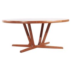 an oval wooden table with two legs and a circular top, on a white background