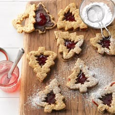 some cookies are sitting on a cutting board