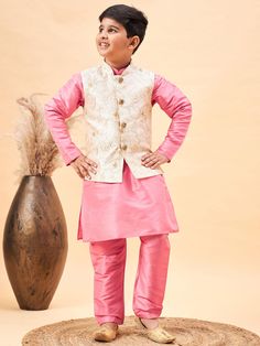 VASTRAMAY Boy's Beige Woven Nehru Jacket With Pink Kurta Pyjama Set Look dapper in this traditional set featuring a beige woven Nehru jacket, a pink kurta and pyjama. Crafted in a comfortable fabric, this set is perfect for any special occasion. Key Features Beige woven Nehru jacket Pink kurta Pyjama Specifications Sleeve Length- Long Sleeves Top shape- Regular Top pattern- Solid Top hemline- Straight Material & Care Jacket fabric: Silk Blend Top fabric: Silk Blend Bottom Fabric: Silk Blend Dry Pink Kurta, Kurta Pyjama, Jacket Fabric, Nehru Jacket, Nehru Jackets, Looking Dapper, Boys Wear, Sleeves Top, Fabric Silk