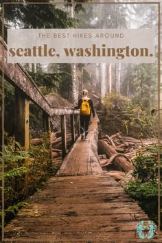 the best hikes around seattle, washington are on this wooden bridge that is surrounded by trees