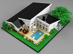 a lego model of a house with a swimming pool