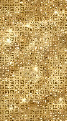 a gold background with small circles on it